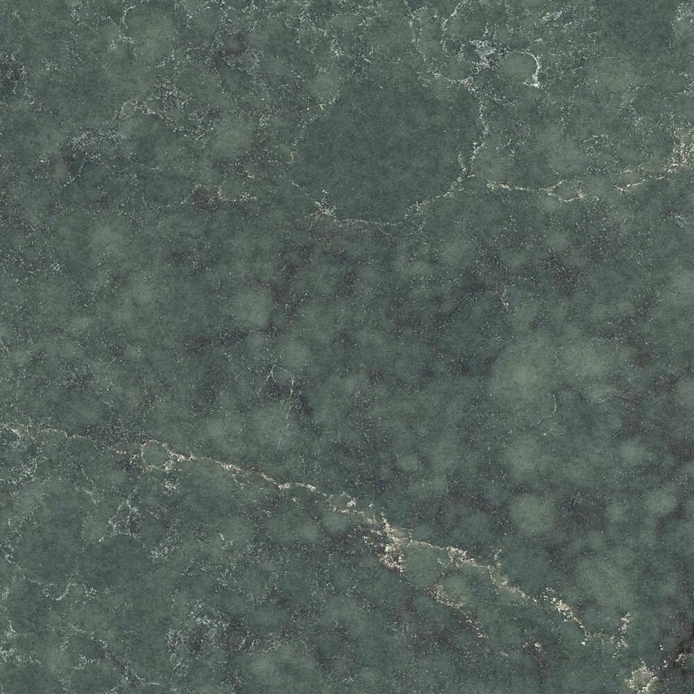 Silestone Jardin Emerald de la línea Le Chic. De color verde con vetas doradas y notas de color negro y crema.